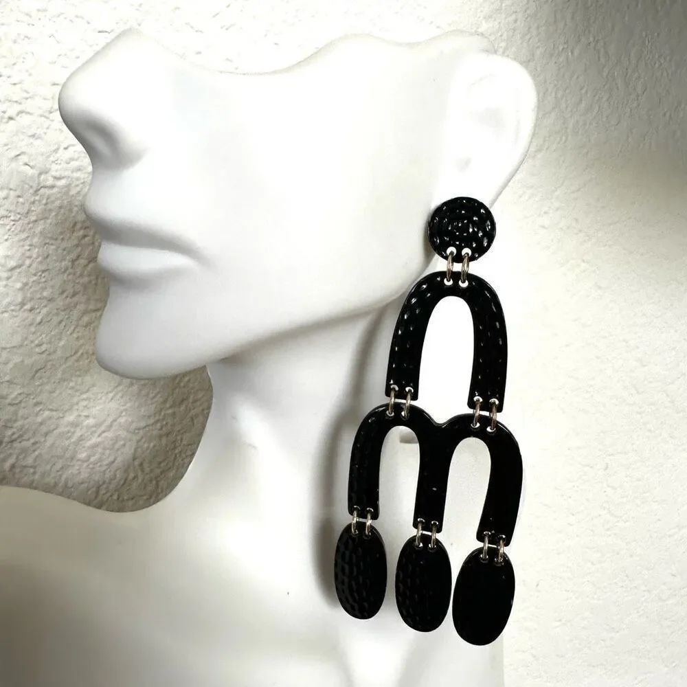 Black and gold tone statement earrings